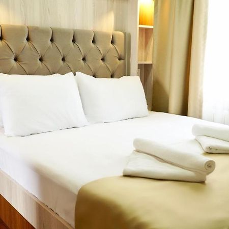 Qonaq Hotel & Suites Стамбул Экстерьер фото
