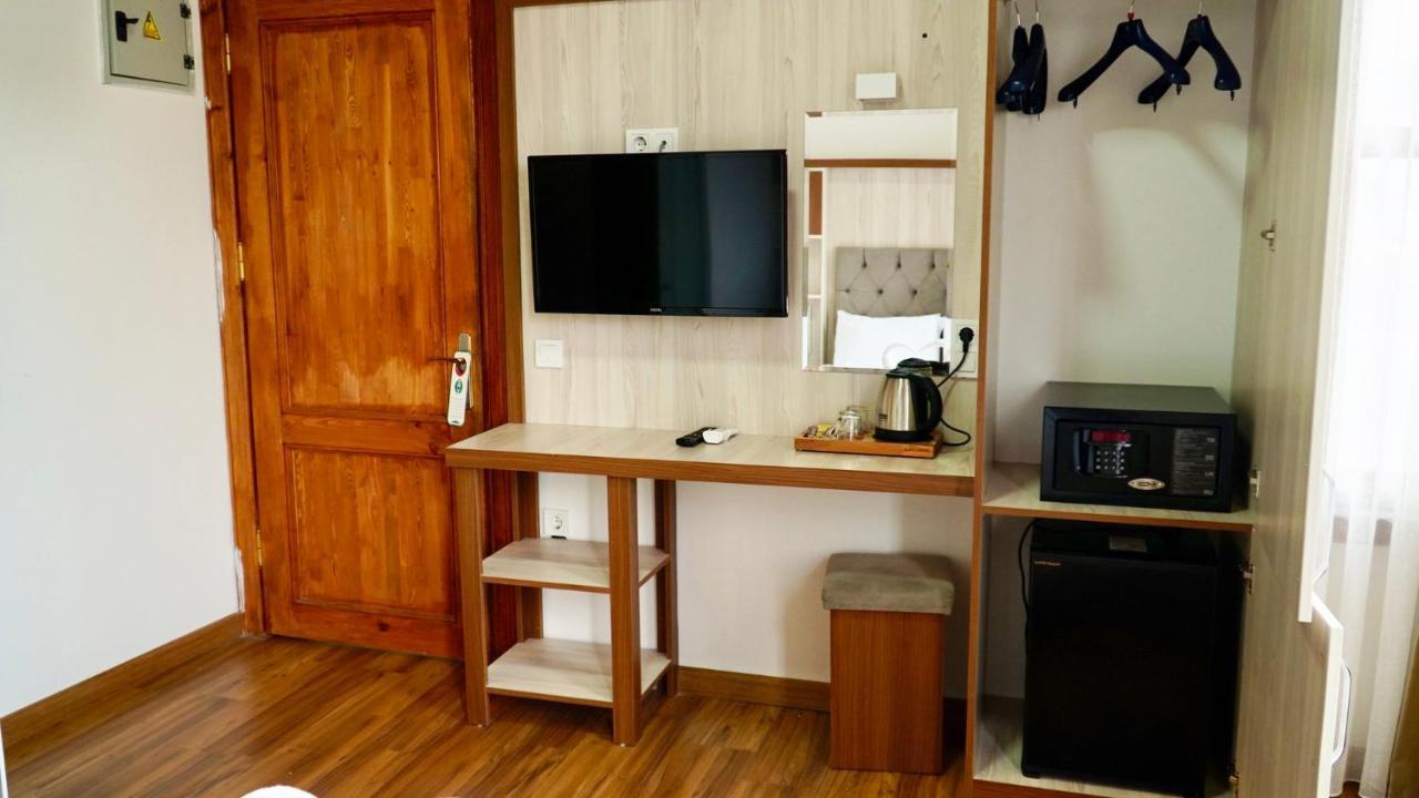 Qonaq Hotel & Suites Стамбул Экстерьер фото