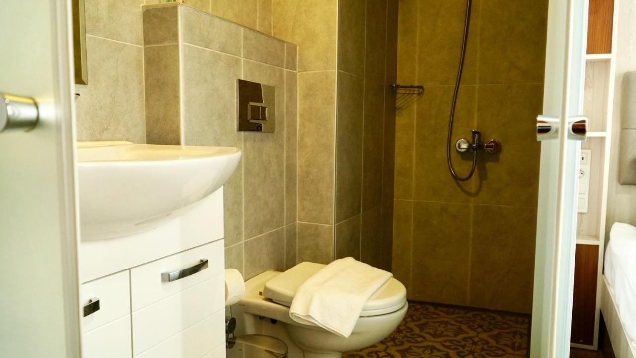 Qonaq Hotel & Suites Стамбул Экстерьер фото